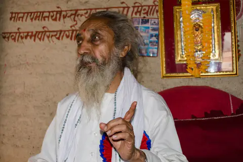 Nepali Baba speaking inside a shrine