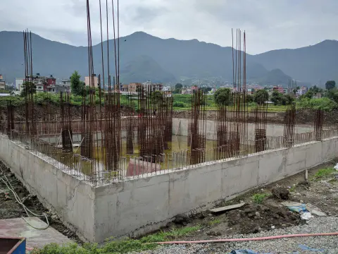 Early concrete foundation work at the proposed temple site